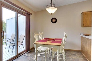Informal dining room with sliding glass door to th