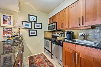 Kitchen featuring a sink, stainless steel applian