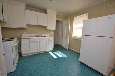 Kitchen includes stove and refrig