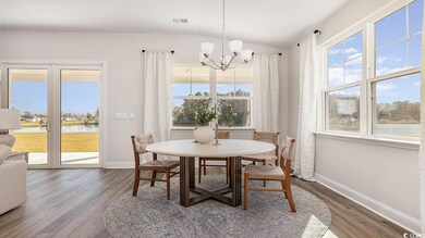 Dining room featuring hardwood / wood-style floori