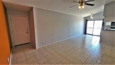 Empty room with light tile patterned floors, ceil