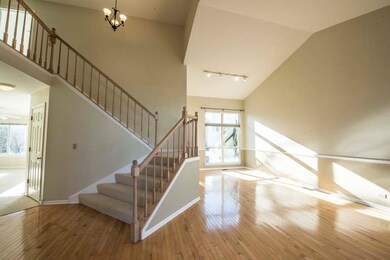 2 story ceiling in Living, Dining room with hardwo