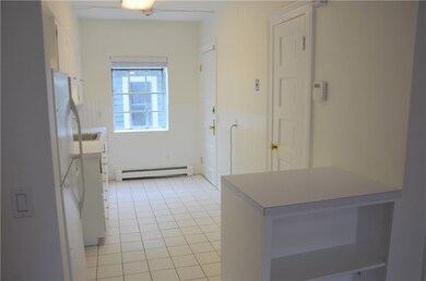 Light, bright kitchen with a second entrance which