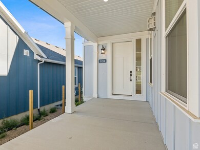 Doorway to property with board and batten siding