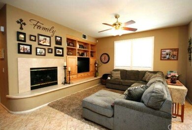 Spacious family room with beautiful fireplace and 