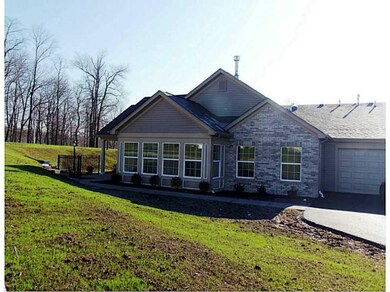 Exterior Front. SIDE VIEW SHOWING 2 CAR GARAGE