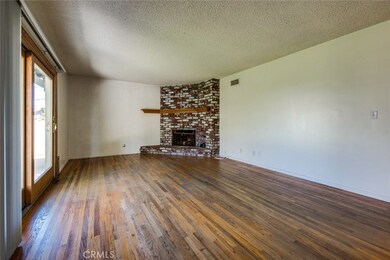 Plenty of room for your big screen in this spacious living room!