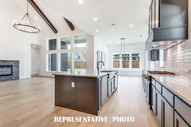 With the kitchen open to the dining and family roo