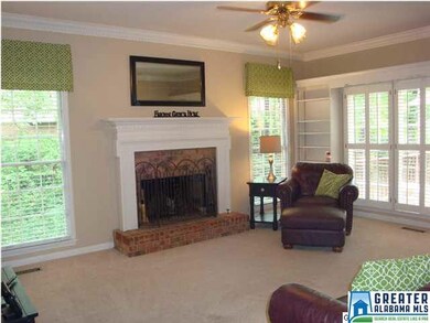Large family room with brick surround fireplace, c