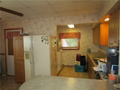 Kitchen. The laundry area off the kitchen.  Conven
