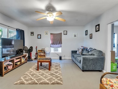 Hallway (Front Unit):
A simple hallway connects the main living areas, giving the home a natural flow. The fresh paint and clean lines make it feel bright and open.