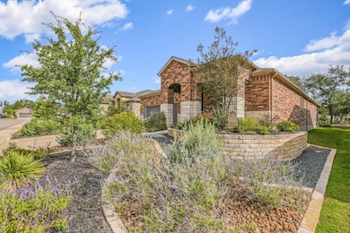 View of front facade featuring brick siding
