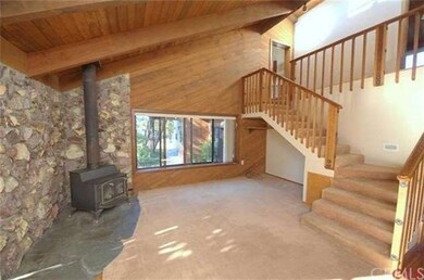 Relax by a cozy fire in your living room equiped w