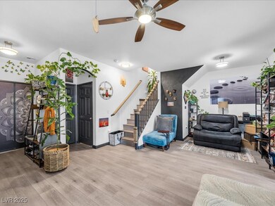 Living room featuring baseboards, visible vents, c