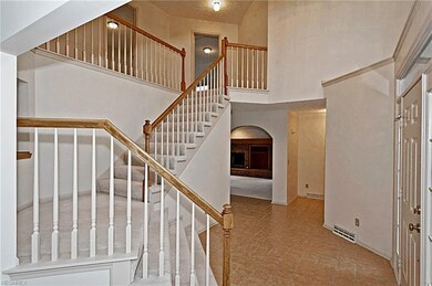 Front foyer is approximately 12'  9'  17' high  Ceramic tile flooring  March 2018 neutral interior paint throughout, including closets and many ceilings. No wallpaper since new.