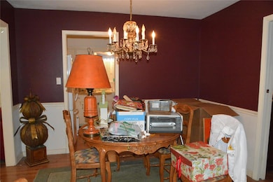 Dining area featuring hardwood / wood-style floors