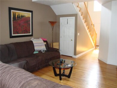 ENTRANCE FOYER TO LIVING ROOM
