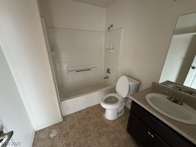 Full bathroom with toilet, shower / bathtub combin