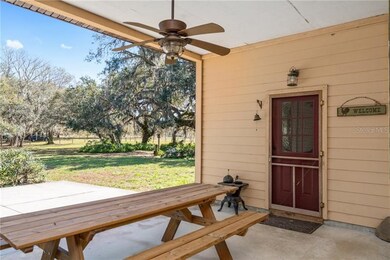 Covered and open patio with a view of the 