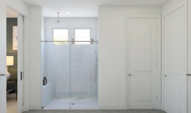 Primary bath with glass-shower enclosure
