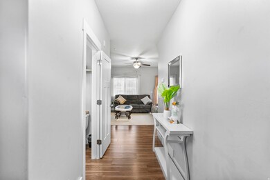 Hall with dark wood finished floors