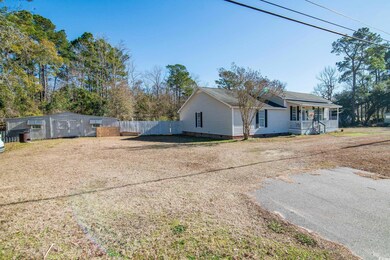 View of property exterior with covered porch