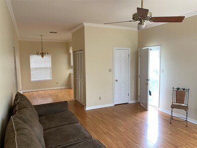 Open to dining area and kitchen