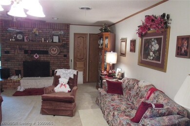 Living room with wood Burning Fire Place
