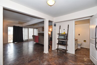 Kitchen is behind the viewer in this shot.  Half b