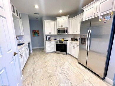 9024 Whimbrel Watch Ln unit 101, Naples, FL 34109 - photo 4