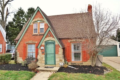 Cape cod home with detached garage