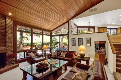 The large family room features access to the backy