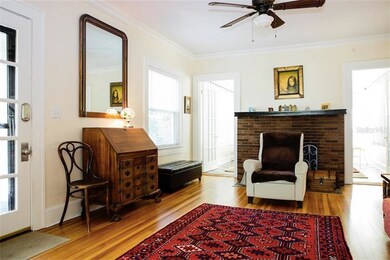 Living room. Front door on left, Florida room in t