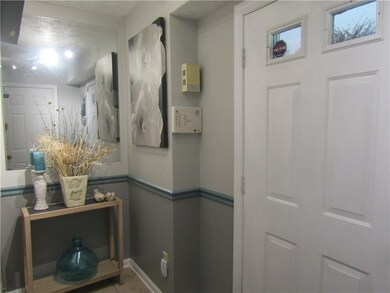 Lots of room in the foyer of your townhouse to gre