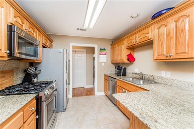 Kitchen with view Stainless Steel appliances and g