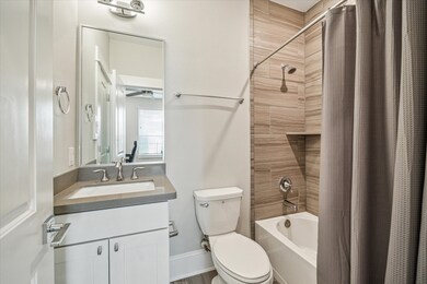 En-suite first floor bathroom with tub/shower comb