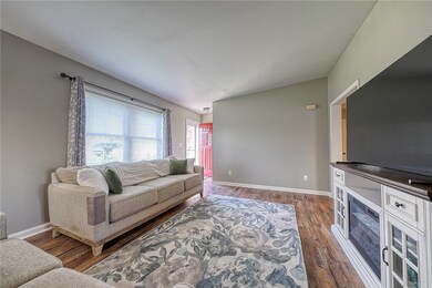 Living area with beautiful LVP flooring, also in m