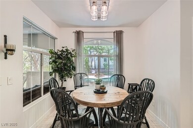 Dining space with light wood-style floors and a ch