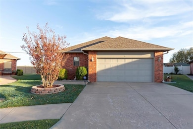 Ranch-style house featuring a shingled roof, concrete driveway, brick siding, and a garage