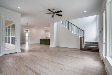 Unfurnished living room with light wood-type floor