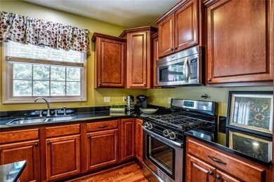 The kitchen comes equipped with stainless steel ap