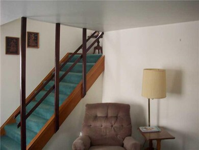 Exterior Front. Wide Staircase
