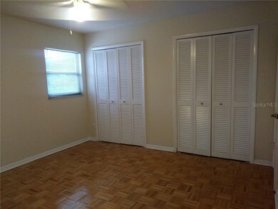 Master bedroom with two closets.