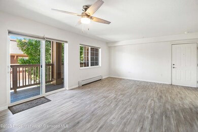 living room with balcony access