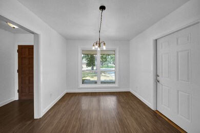 Dining area situated at the front of the home for