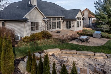 Back of home, entry to patio and fire pit areas