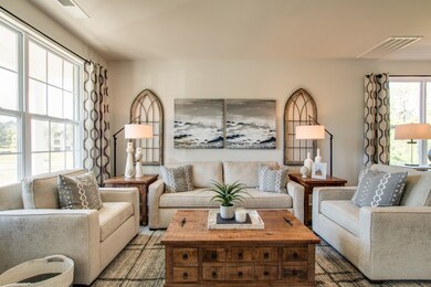 Photos are of our previous model home.  Some finishes and cabinet colors have changed for our newest buildings.  Please contact the listing agent for the details.