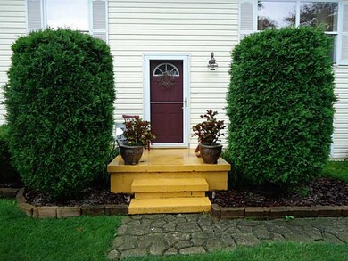 Exterior Front. Meticulous landscaping makes for a