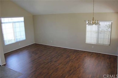 Large open living room with vaulted ceilings.