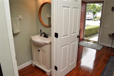 Guest Bathroom, and the front door on the back right.